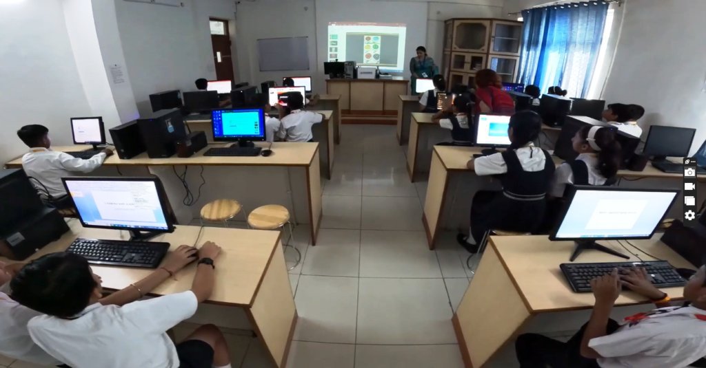 A smart classroom session in progress at Excellia School