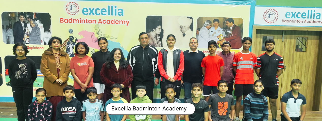 The Excellia Badminton Academy team with coaching staff
