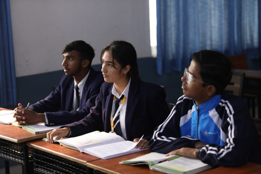 Students at Excellia School studying in class